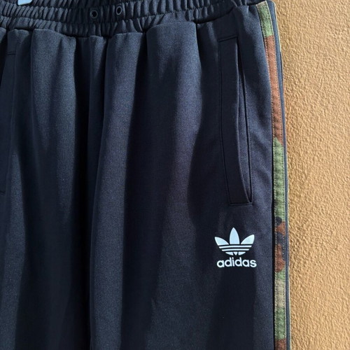 Adidas Originals women's black sweatpants with camouflage stripes like new