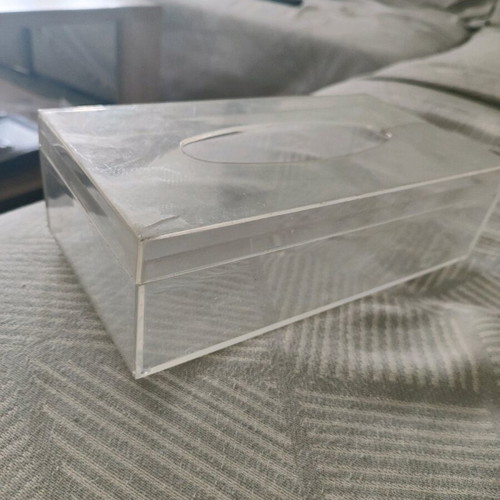 Plastic tissue box used, slightly cracked