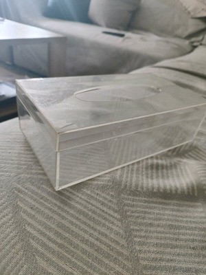 Plastic tissue box used, slightly cracked