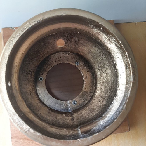 Vintage metal vessel with wooden base used, decorative aroma container