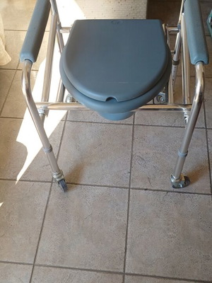 Folding commode chair with wheels