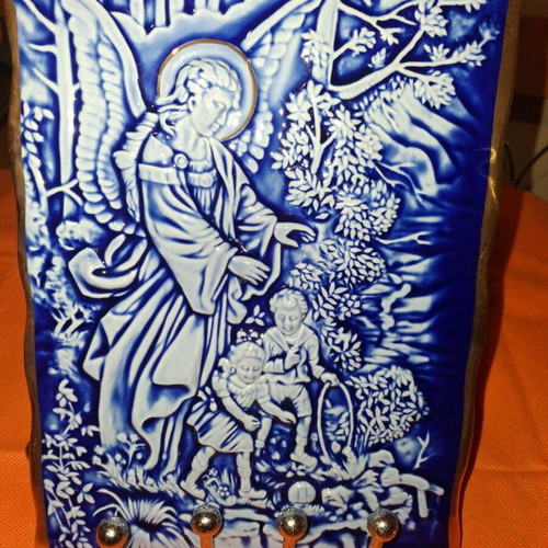 Relief porcelain and gold image handmade like new