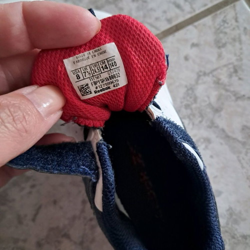Reebok kids' athletic shoes size 24.5 used with box and stain