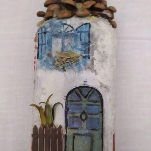 Decorative house used, made from bottle