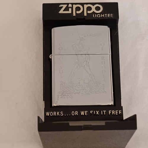 Zippo Colossus of Rhodes lighter used, laser engraved, made in USA
