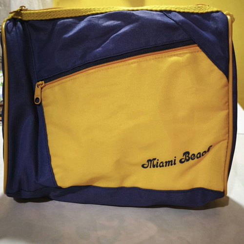 Toiletry bag used purple and yellow