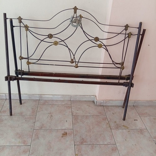 Old bed frame without headboard