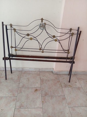 Old bed frame without headboard