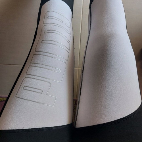 Puma leggings used, white and black, women's size M