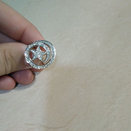 Women's ring with sparkling silver star, like new