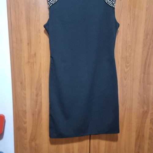 Women's black dress like new with studs on shoulders