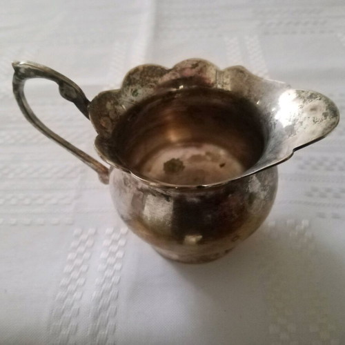 Silver-plated vintage Granny's milk jug used