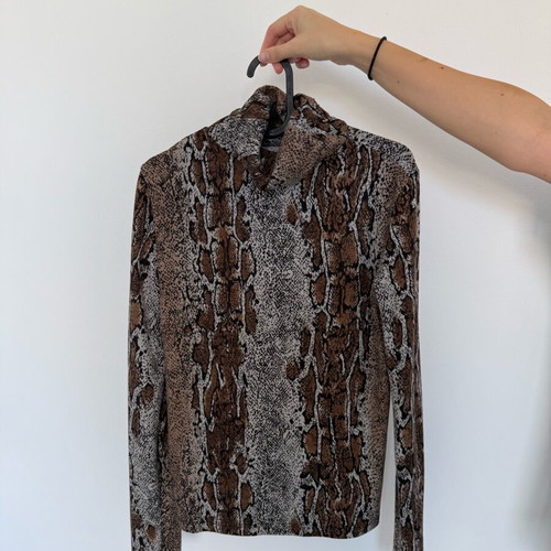 Polo blouse leopard print size S like new