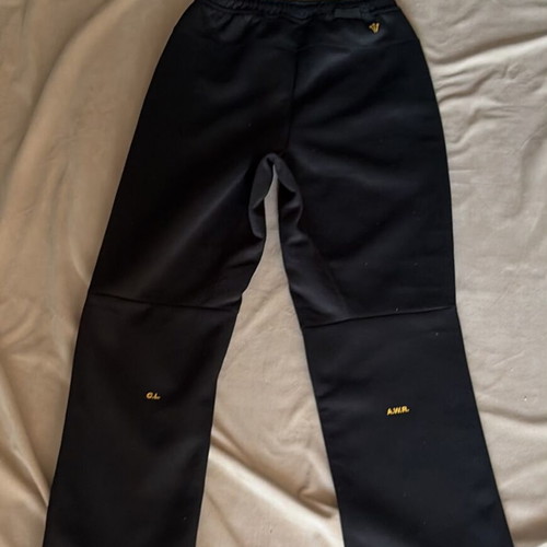 Nike NOCTA sweatpants new, black with yellow details, size M