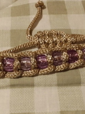Handmade bracelet for women with thick shiny cord and large beads