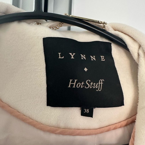 Lynne coat used in ecru color with hood