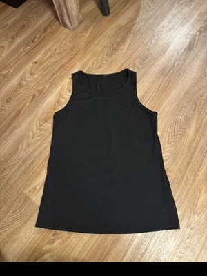 Black sleeveless top, size M