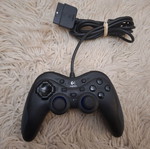Logitech Action Controller употребяван жичен контролер за PlayStation 1 и 2
