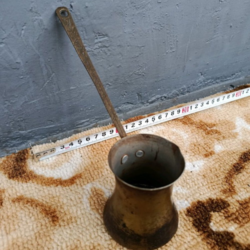 Old cezve handmade with engraved handle, used