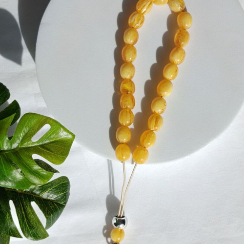Komboloi with 22 yellow oval beads like new