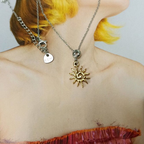 Steel sun necklace new with gold-plated element and chain