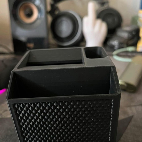 Icos holder with built-in ashtray