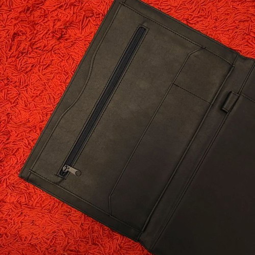 Clutch used, black with gold clasp, leatherette material
