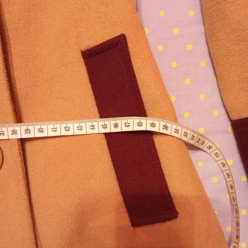 Beige coat with burgundy size medium like new