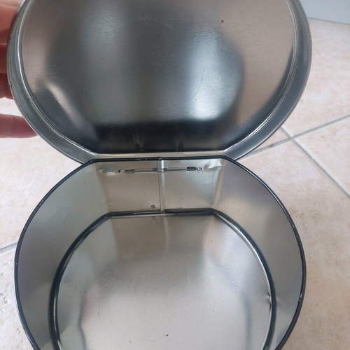 Tiger metal storage box with penguin design like new
