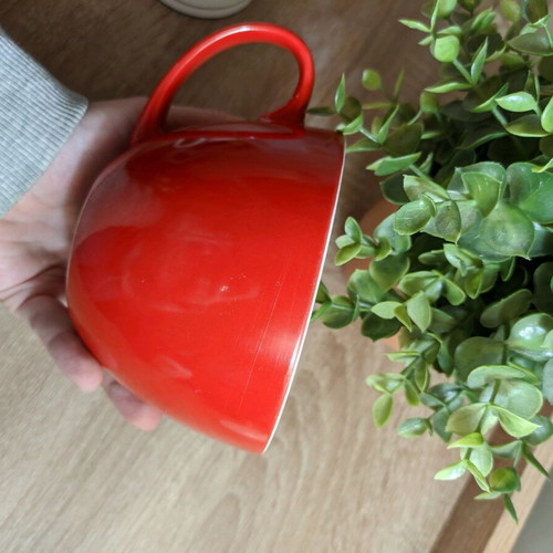 Large mug used for coffee or cereals, red