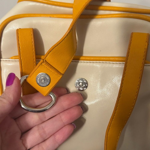 Handheld bag beige and orange colors like new