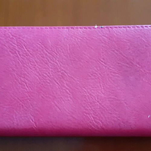 Pink wallet used with white bow
