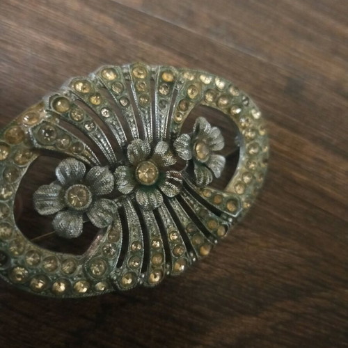Brooch used, gray color