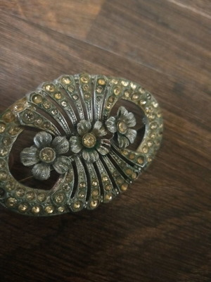 Brooch used, gray color