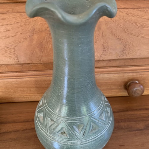 Handmade ceramic vase with carved geometric patterns, like new