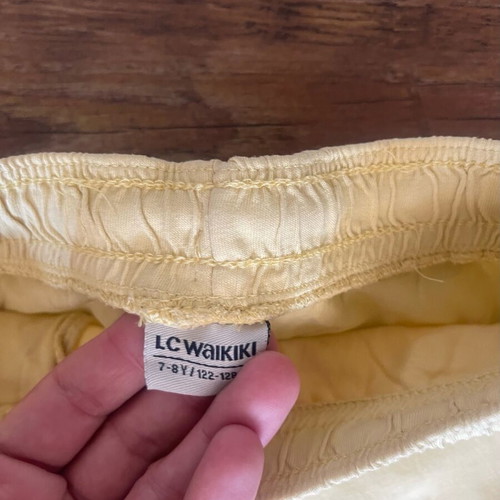 Children's shorts size 7 years used, yellow, 122 cm