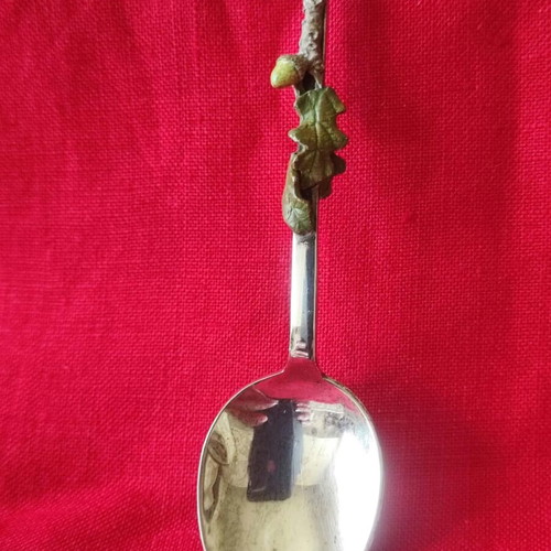 Collectible dessert spoon with 3D resin decoration, like new