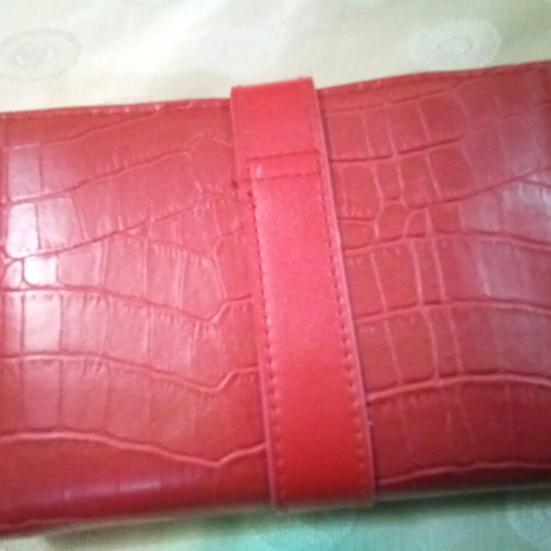 Women's wallet used, red with multiple compartments