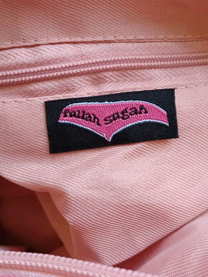 Fullah Sugah pink hand bag like new with decorative charms