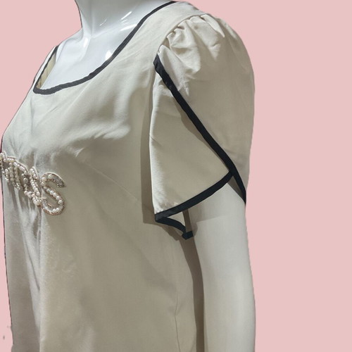 G Shein blouse L used, beige with black trim and embroidered pearls