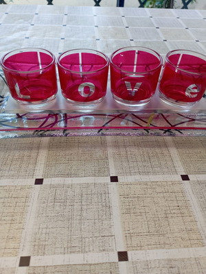 Table decor set with glass tray and 4 glass cups spelling LOVE
