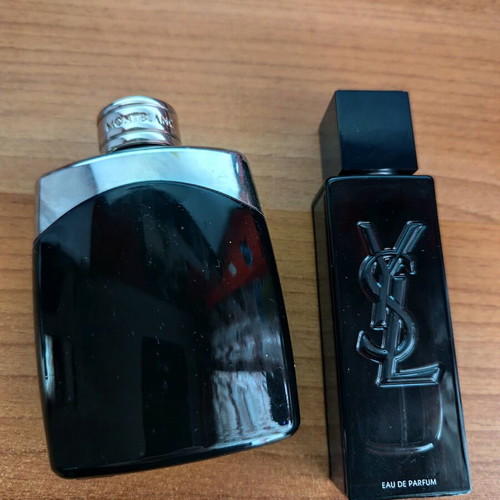 Empty Montblanc Legend 100ml and Yves Saint Laurent MYSLF 40ml perfume bottles used