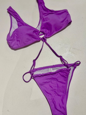 Bikini set new with tags, purple, sizes medium and large