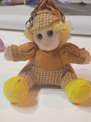Fabric doll keychain used from the '80s