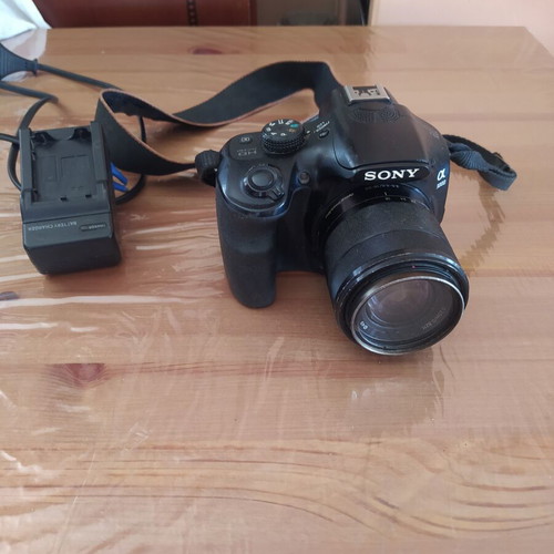 Sony A3000 camera used with E 18-55 3.5-5.6 OSS lens and accessories