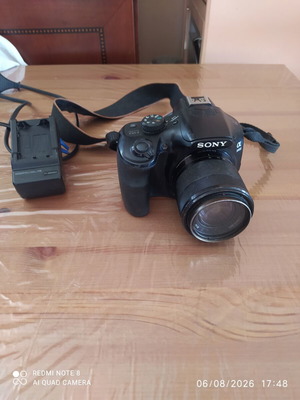 Sony A3000 camera used with E 18-55 3.5-5.6 OSS lens and accessories