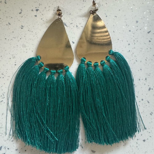 Dangling earrings used, gold-colored