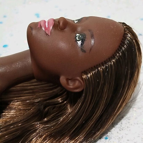 Barbie Made to Move African-American doll used with small flaws