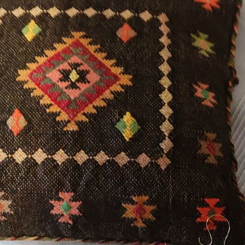 Handwoven pillow used, handmade