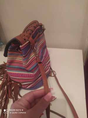 Backpack with fringes like new, brown